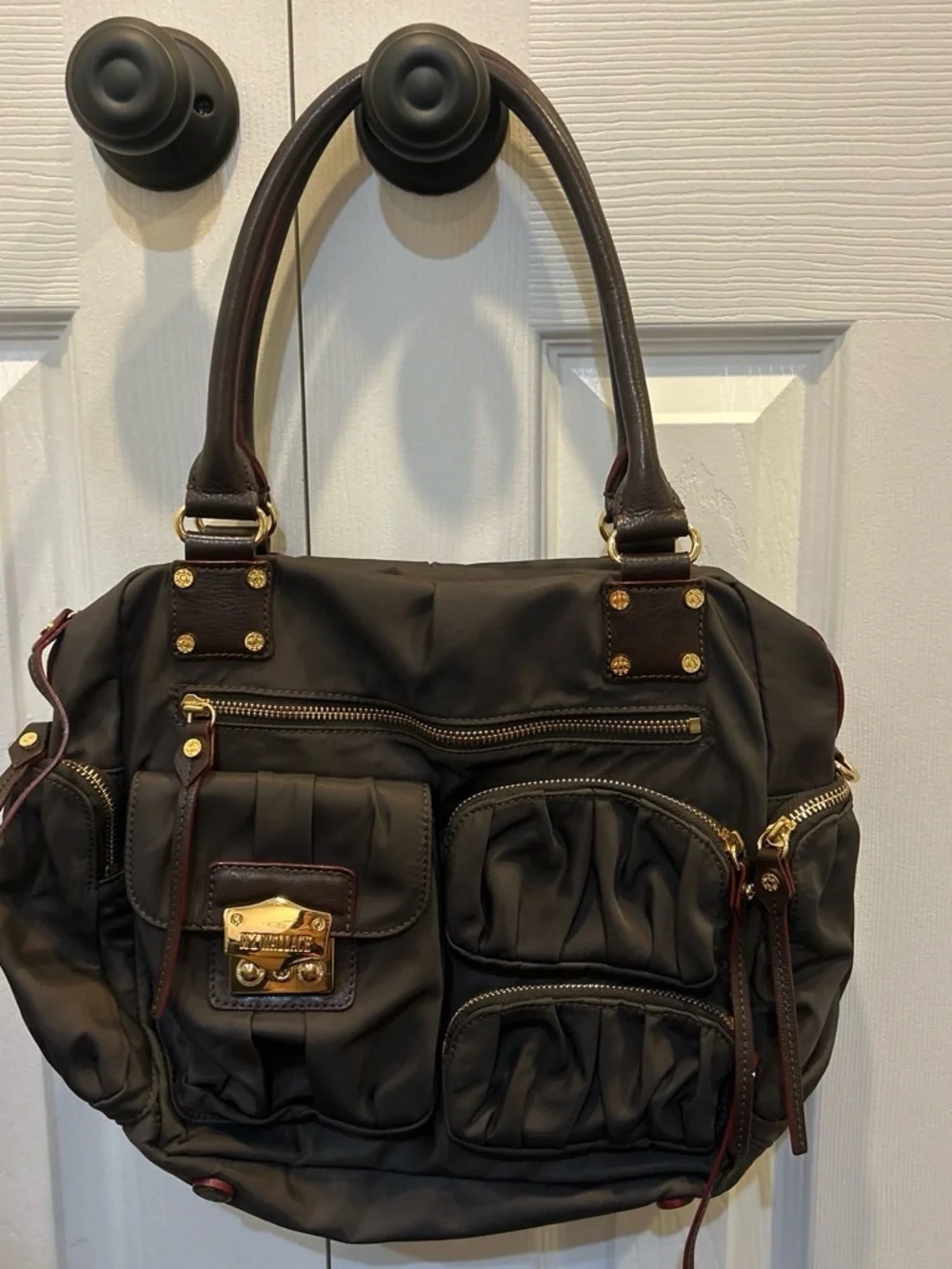MZ Wallace Shoulder Bag with Gold Hardware and red detail